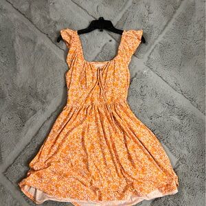 Size 3-5
White and Orange sun dress
Never Worn